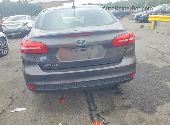 1FADP3F25JL213779 2018 FORD FOCUS Серый Вид сзади