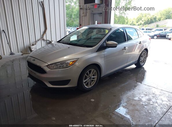 1FADP3F25JL328284 2018 FORD FOCUS Silver Vista tres cuartos delantera izquierda