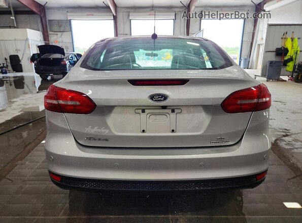 1FADP3F26GL361206 2016 FORD FOCUS Silver Vista trasera