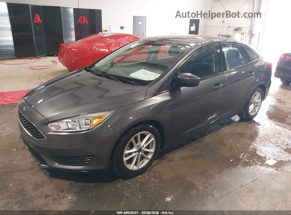 1FADP3F26JL328231 2018 FORD FOCUS Gray Vista tres cuartos delantera izquierda