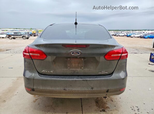 1FADP3F27GL391556 2016 FORD FOCUS Gray Rear view