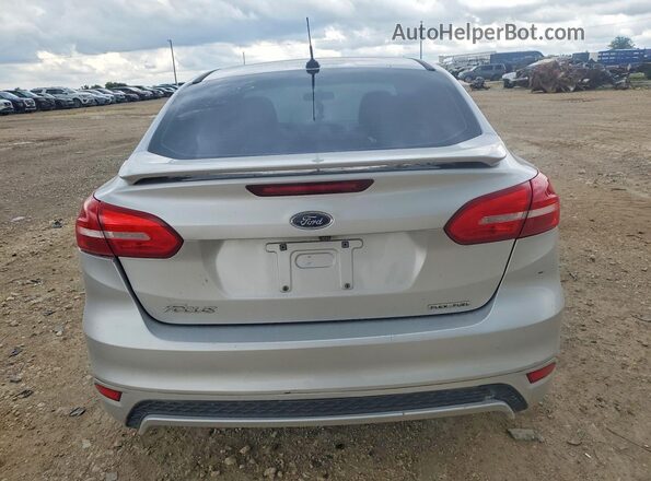1FADP3F27GL395221 2016 FORD FOCUS Silver Вид ззаду