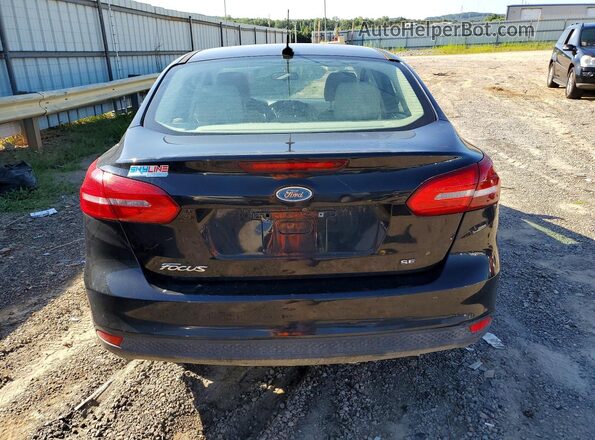 1FADP3F27JL202024 2018 FORD FOCUS Black Rear view