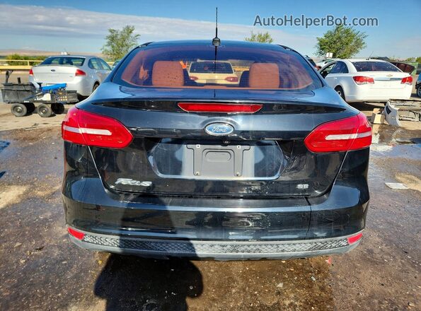 1FADP3F27JL260294 2018 FORD FOCUS Black Вид ззаду