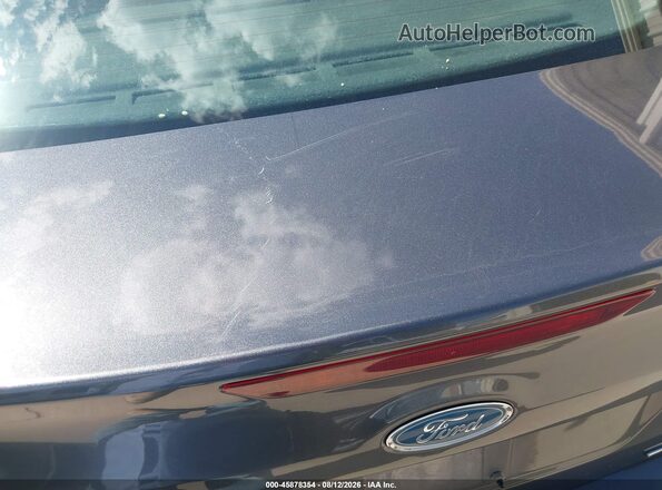 1FADP3F28GL346285 2016 FORD FOCUS Серый Вид задней части салона