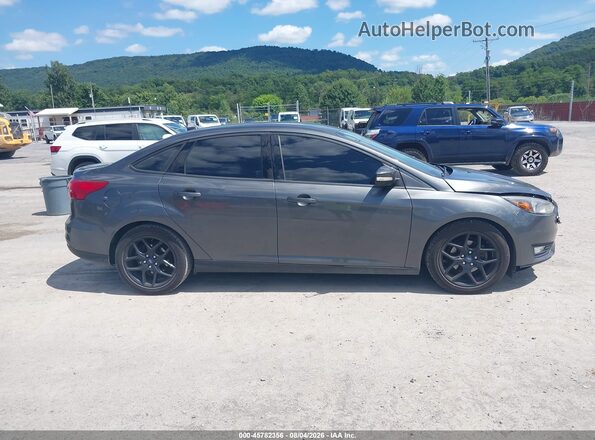 1FADP3F28GL390111 2016 FORD FOCUS Gray Vista interior trasera
