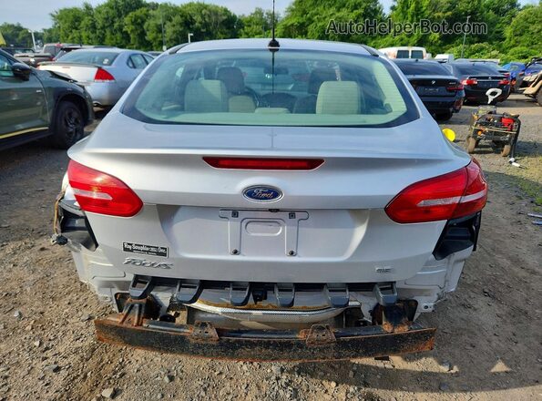 1FADP3F28JL290890 2018 FORD FOCUS Silver Rear view