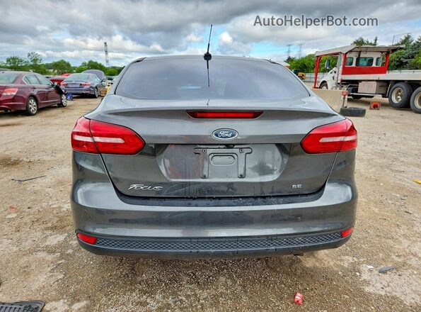 1FADP3F29JL300617 2018 FORD FOCUS Gray Widok z tyłu