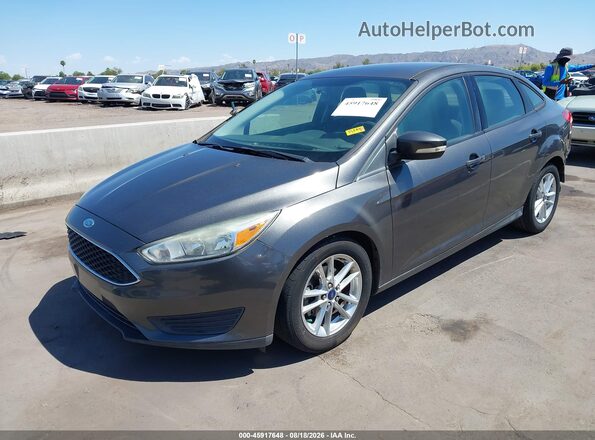 1FADP3F2XGL272271 2016 FORD FOCUS Gray Front left