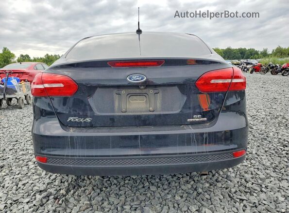 1FADP3F2XGL274800 2016 FORD FOCUS Black Vista trasera