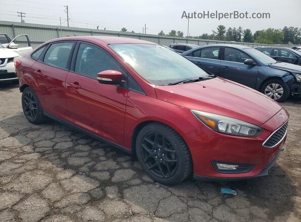 1FADP3F2XGL302403 2016 FORD FOCUS Maroon Front right