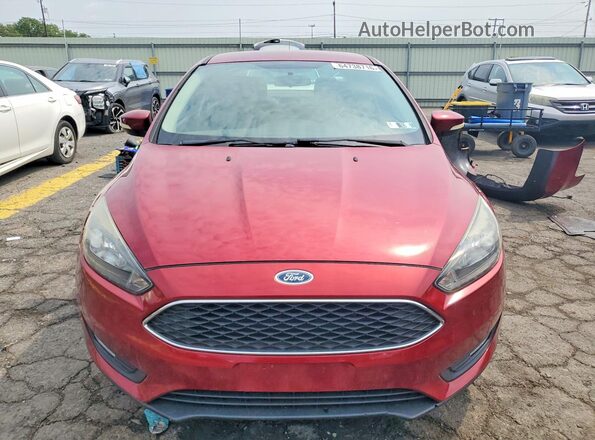 1FADP3F2XGL302403 2016 FORD FOCUS Maroon Front view