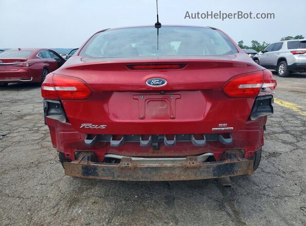 1FADP3F2XGL302403 2016 FORD FOCUS Maroon Rear view