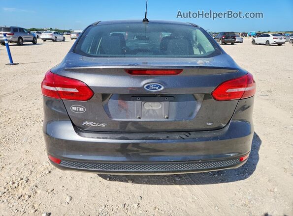 1FADP3F2XJL270401 2018 FORD FOCUS Gray Rear view
