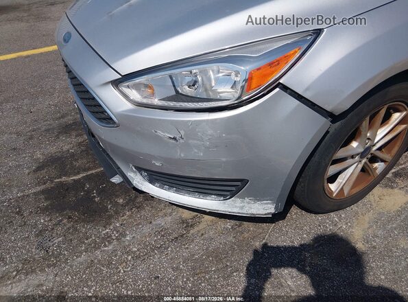 1FADP3FE2JL284500 2018 FORD FOCUS Серебряный Вид спереди