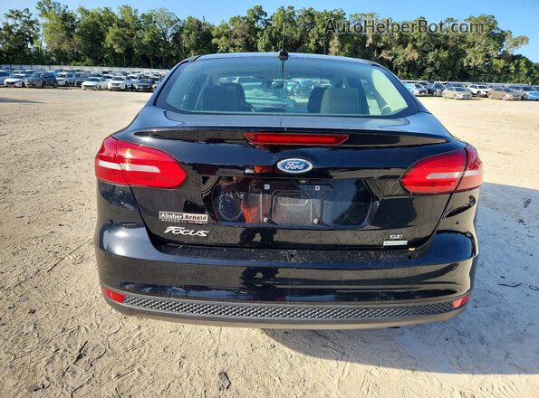 1FADP3FE4JL203738 2018 FORD FOCUS Black Vista trasera