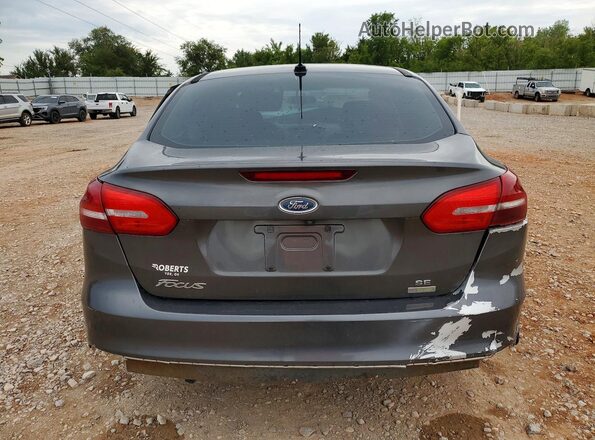 1FADP3FE6JL269966 2018 FORD FOCUS Gray Вид ззаду