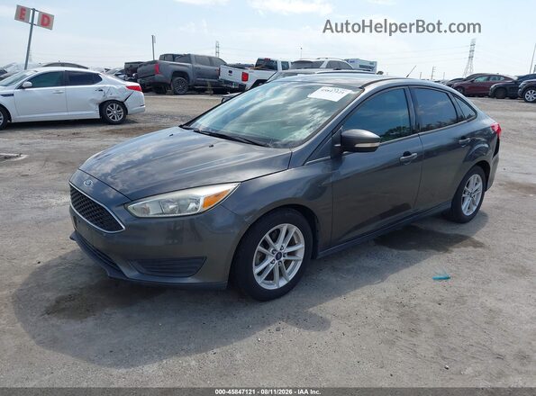 1FADP3FE7HL223122 2017 FORD FOCUS Gray Vista tres cuartos delantera izquierda