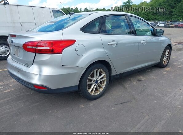 1FADP3FE7JL307043 2018 FORD FOCUS Silver Trasero derecho