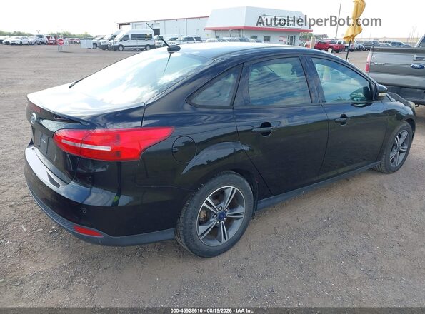 1FADP3FE8GL306931 2016 FORD FOCUS Black Widok z przodu