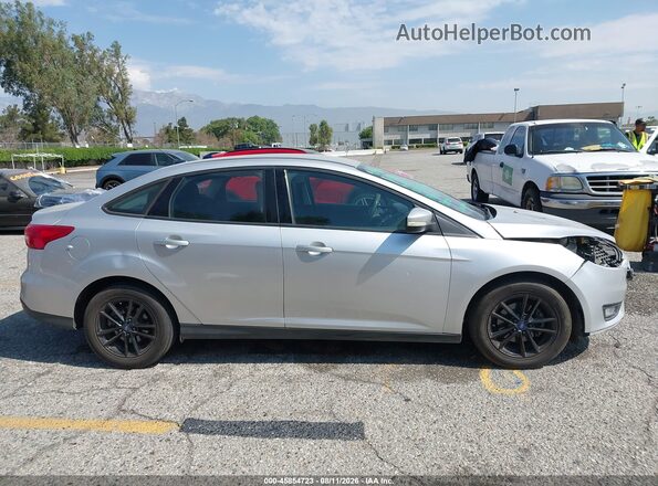 1FADP3FEXHL230498 2017 FORD FOCUS Silver Вид задньої частини салону