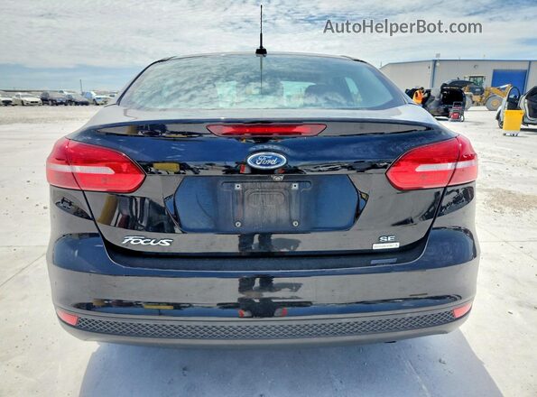 1FADP3FEXJL229387 2018 FORD FOCUS Black Вид ззаду