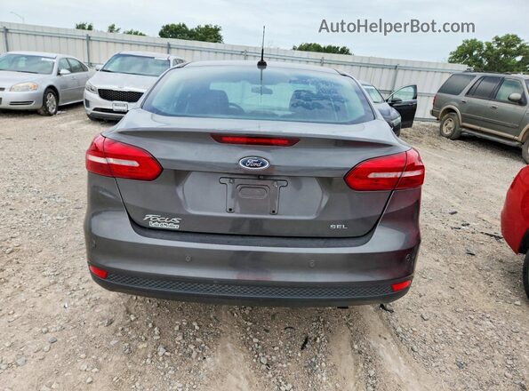 1FADP3H20HL319077 2017 FORD FOCUS Gray Widok z tyłu