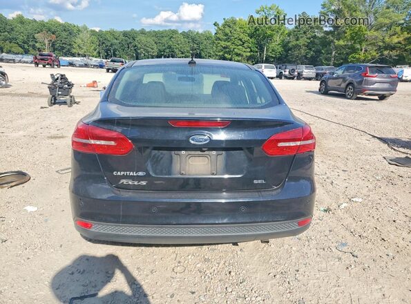 1FADP3H24JL294481 2018 FORD FOCUS Black უკანა ხედი
