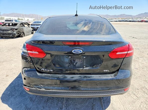 1FADP3H26JL217482 2018 FORD FOCUS Black უკანა ხედი