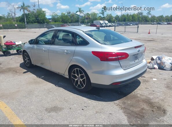 1FADP3H26JL299682 2018 FORD FOCUS Silver Trasero izquierdo
