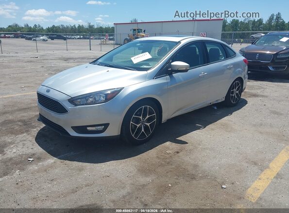 1FADP3H26JL299682 2018 FORD FOCUS Silver Vista tres cuartos delantera izquierda