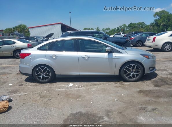 1FADP3H26JL299682 2018 FORD FOCUS Silver Vista interior trasera