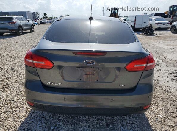 1FADP3H28JL215541 2018 FORD FOCUS Gray Vista trasera