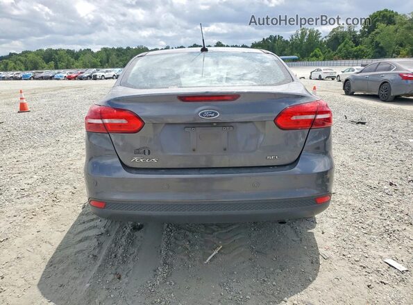 1FADP3H29HL241494 2017 FORD FOCUS Gray Vista trasera
