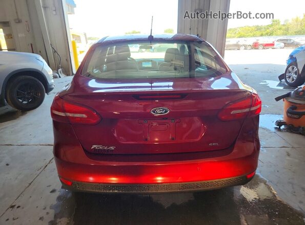 1FADP3H29HL302391 2017 FORD FOCUS Maroon Vista trasera