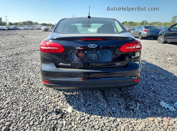 1FADP3H29HL313410 2017 FORD FOCUS Black Вид ззаду