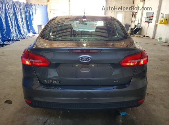 1FADP3H2XHL248471 2017 FORD FOCUS Серый Вид сзади
