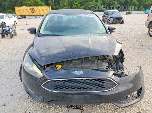 1FADP3H2XJL321439 2018 FORD FOCUS Black Front view