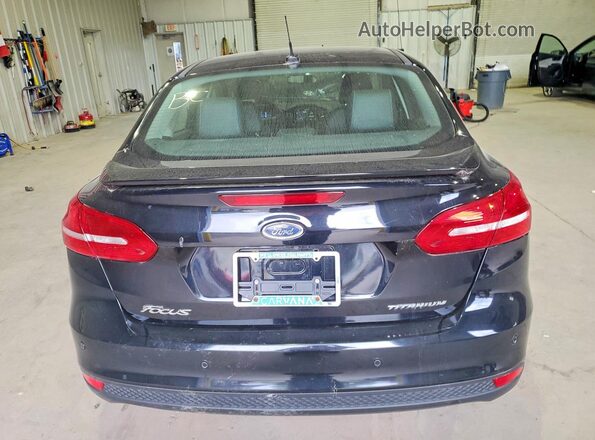 1FADP3J20JL273394 2018 FORD FOCUS Black Вид ззаду