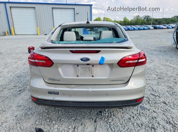 1FADP3J21HL321902 2017 FORD FOCUS Желто-коричневый Вид сзади
