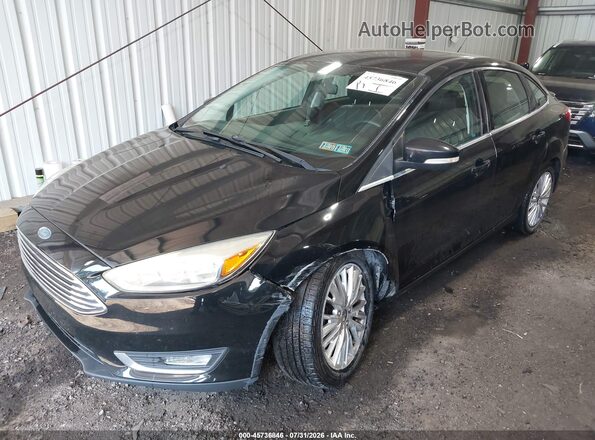 1FADP3J22HL329569 2017 FORD FOCUS Black Вид спереду