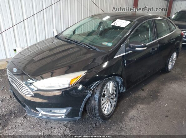 1FADP3J22HL329569 2017 FORD FOCUS Black Передня ліва чверть