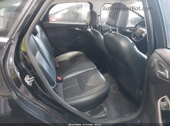 1FADP3J22HL329569 2017 FORD FOCUS Black Вид наклейки з VIN-кодом