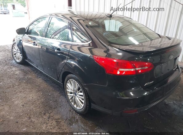 1FADP3J22HL329569 2017 FORD FOCUS Black Задня ліва чверть