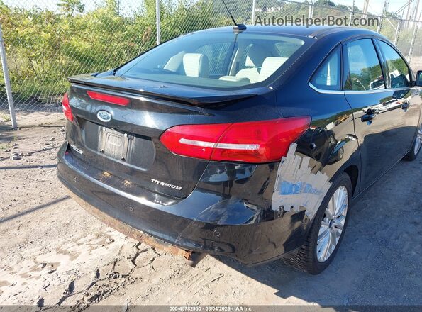 1FADP3J22JL317069 2018 FORD FOCUS Black Դիմացի տեսք
