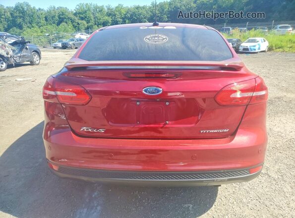 1FADP3J23HL326681 2017 FORD FOCUS Burgundy Vista trasera