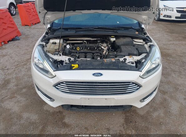 1FADP3J24JL314934 2018 FORD FOCUS White Rear view