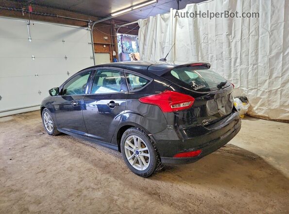 1FADP3K23HL295012 2017 FORD FOCUS Black Rear left