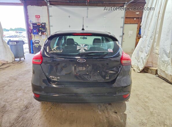 1FADP3K23HL295012 2017 FORD FOCUS Black Rear view