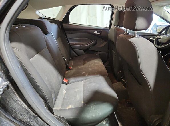 1FADP3K23HL295012 2017 FORD FOCUS Black Rear seats view